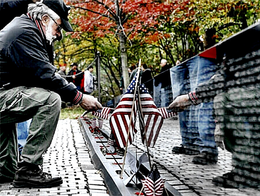 A soldier visits the Vietnam War Memorial